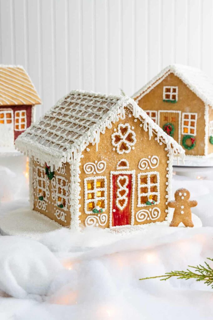 Want to win the best gingerbread house decorating contest this year? Then, take a look at these 25 fabulous gingerbread house designs that'll guarantee compliments!